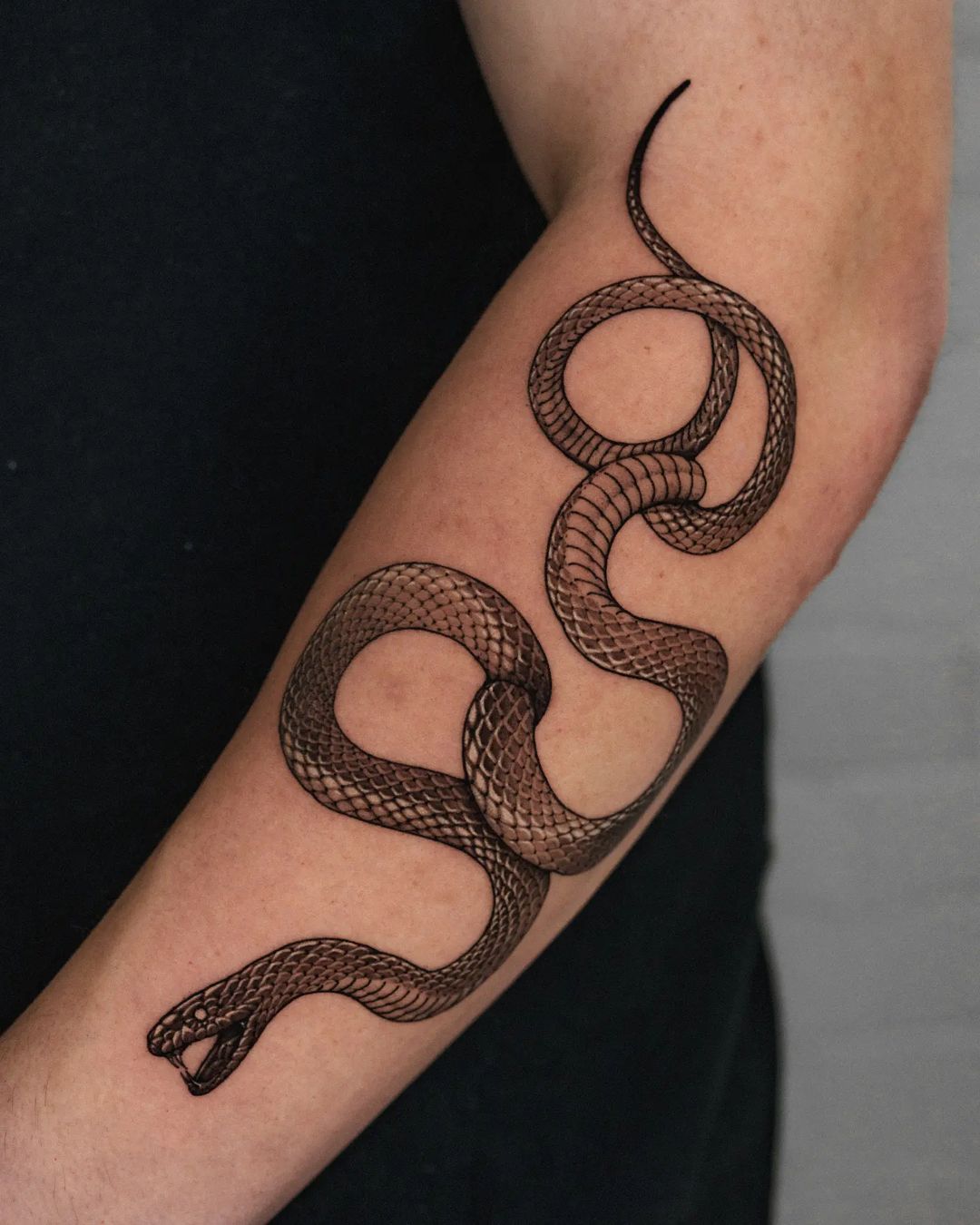 Black snake tattoo by koonoblk