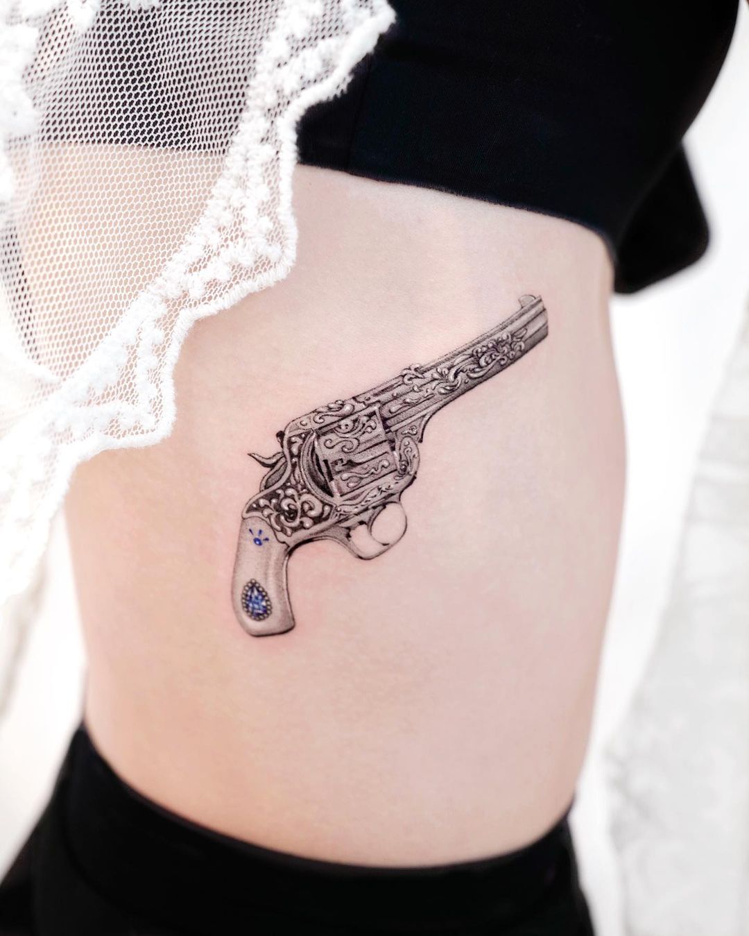 Cute gun tattoo design by tattooist solar