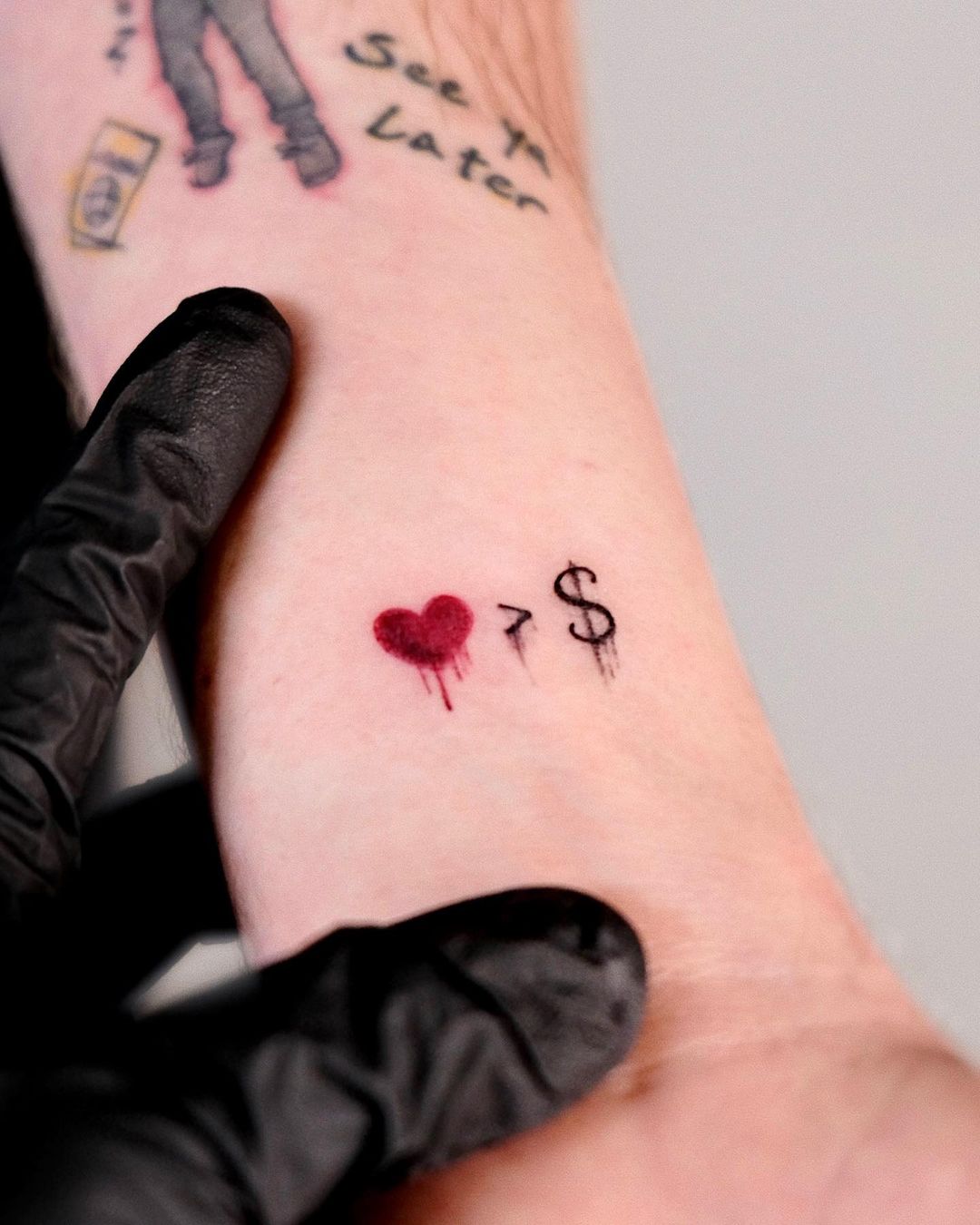 Cute heart tattoo by soapy tattoo