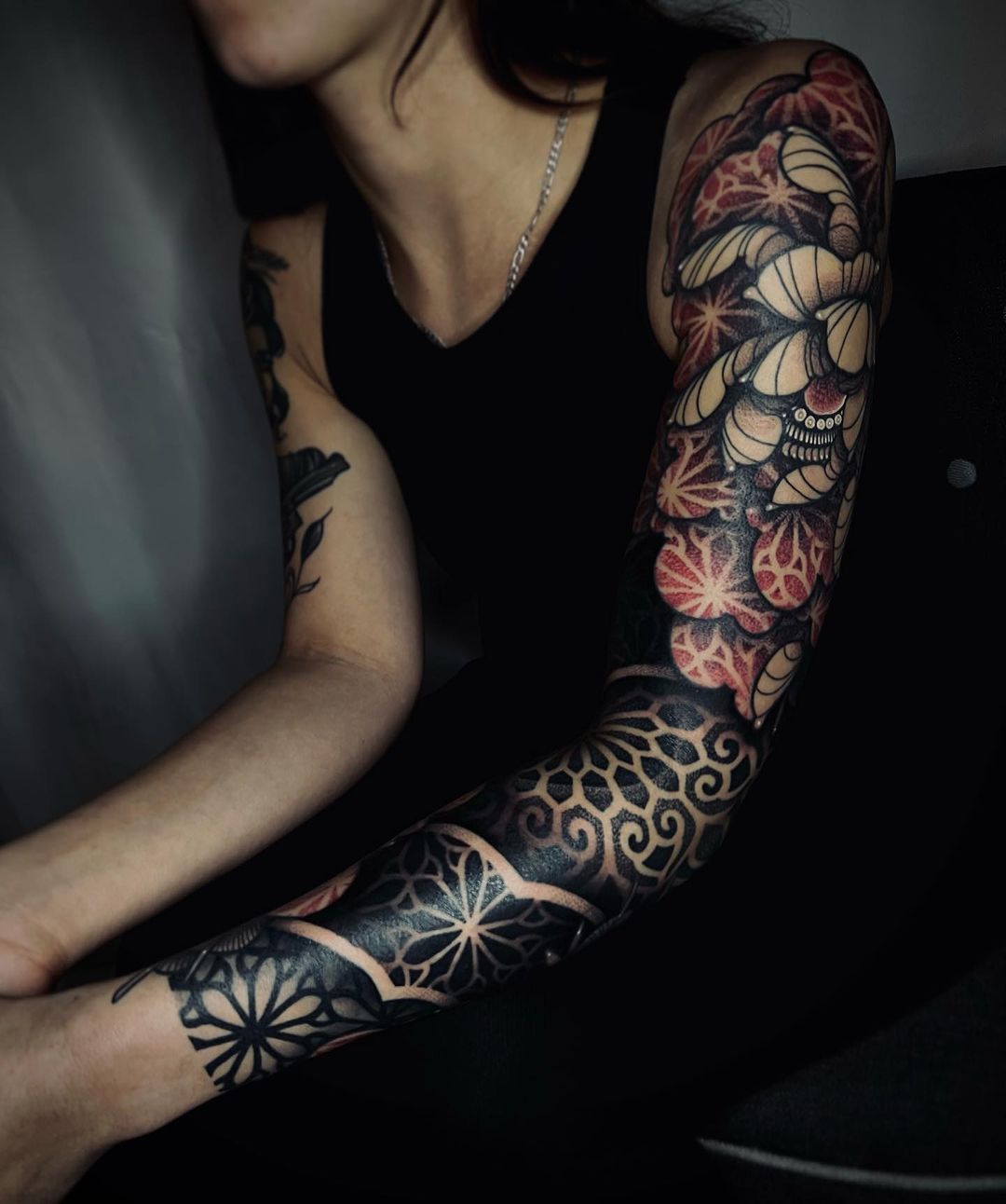 Full arm black inked tattoos by monsieur berdah