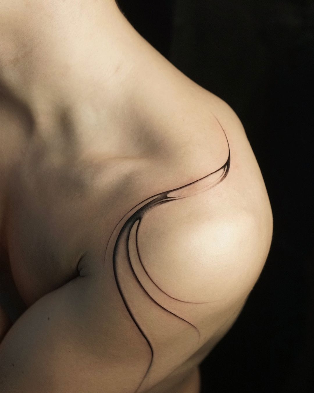 Simple shoulder tattoos for men by tattooist.pado