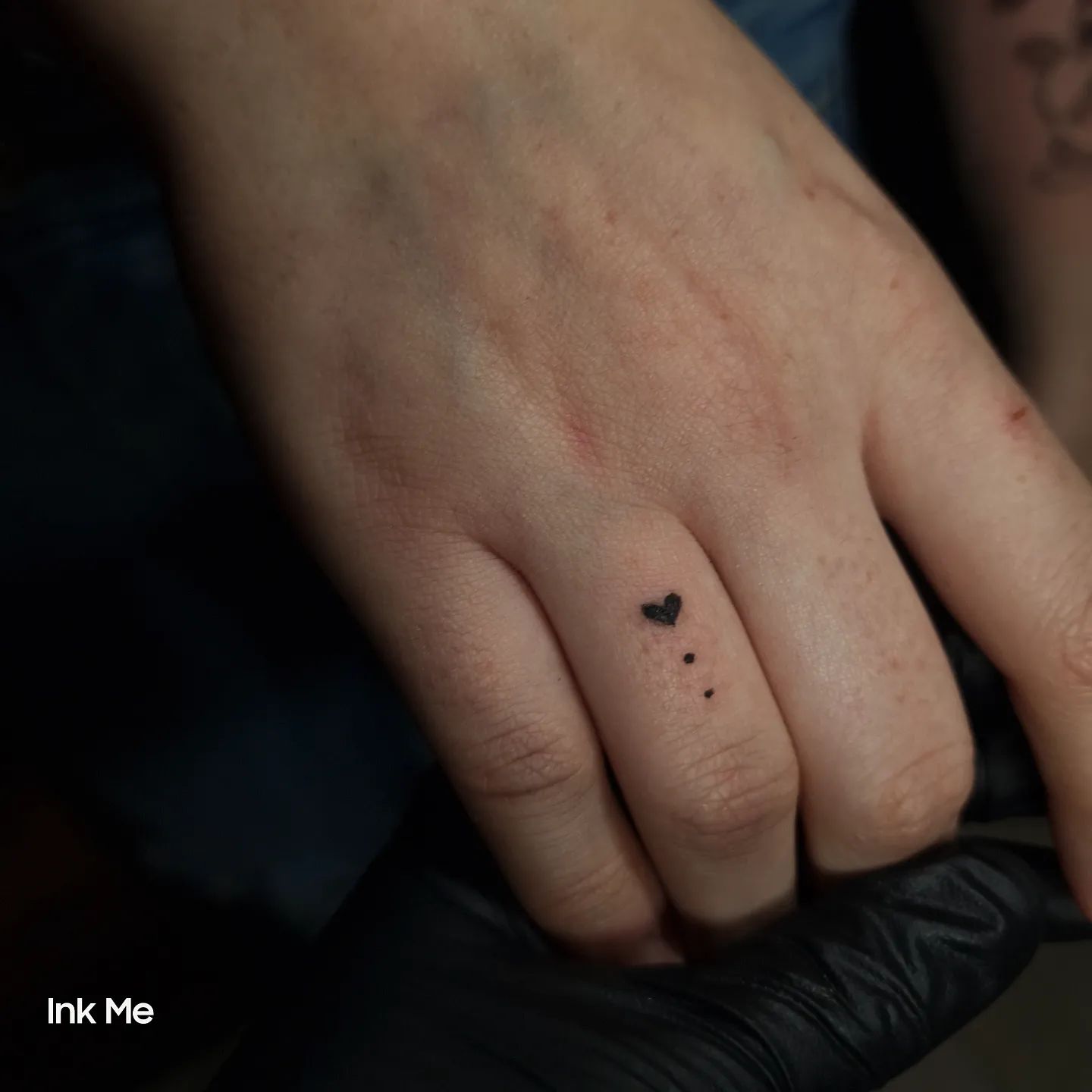 Small finger tattoo design by ink me tattooartist