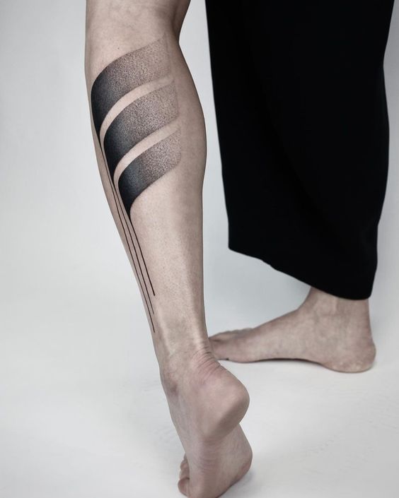 amazing black inked leg tattoo