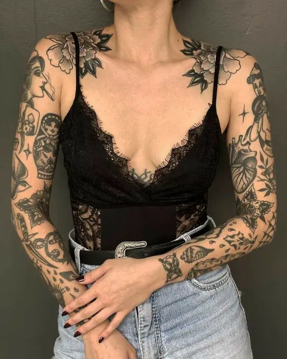 black ink tattoo on arm