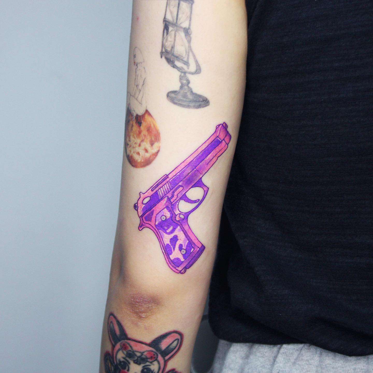 colorful gun tattoo by neosian