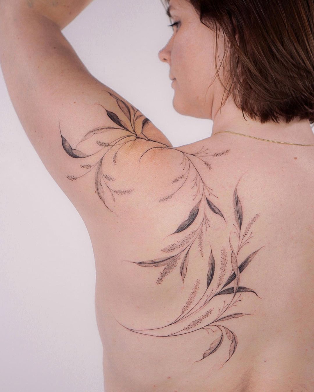 elegant flower tattoo by lasstattoo
