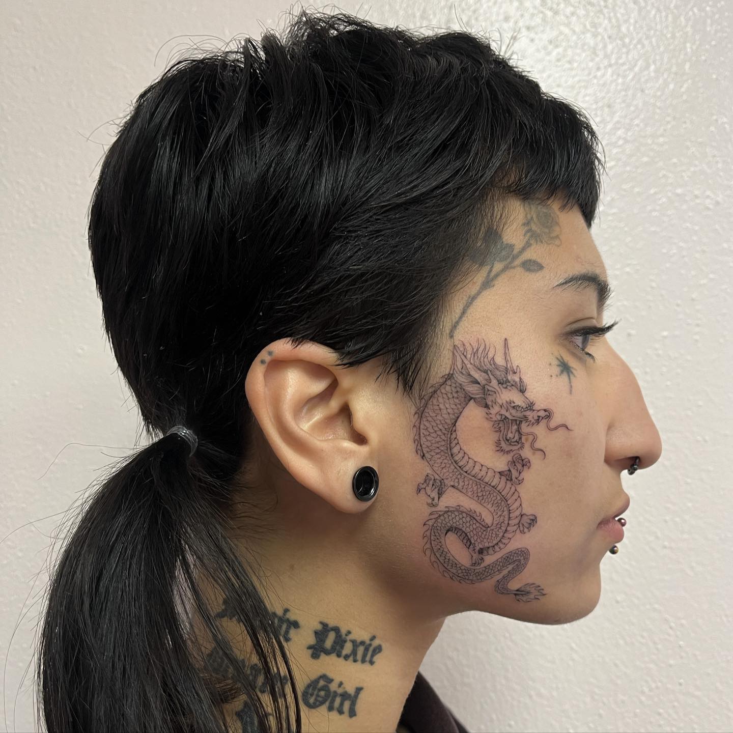 face dragon tattoo by rachael ann bell