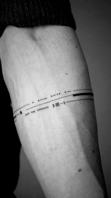 fineline simple forearm tattoo
