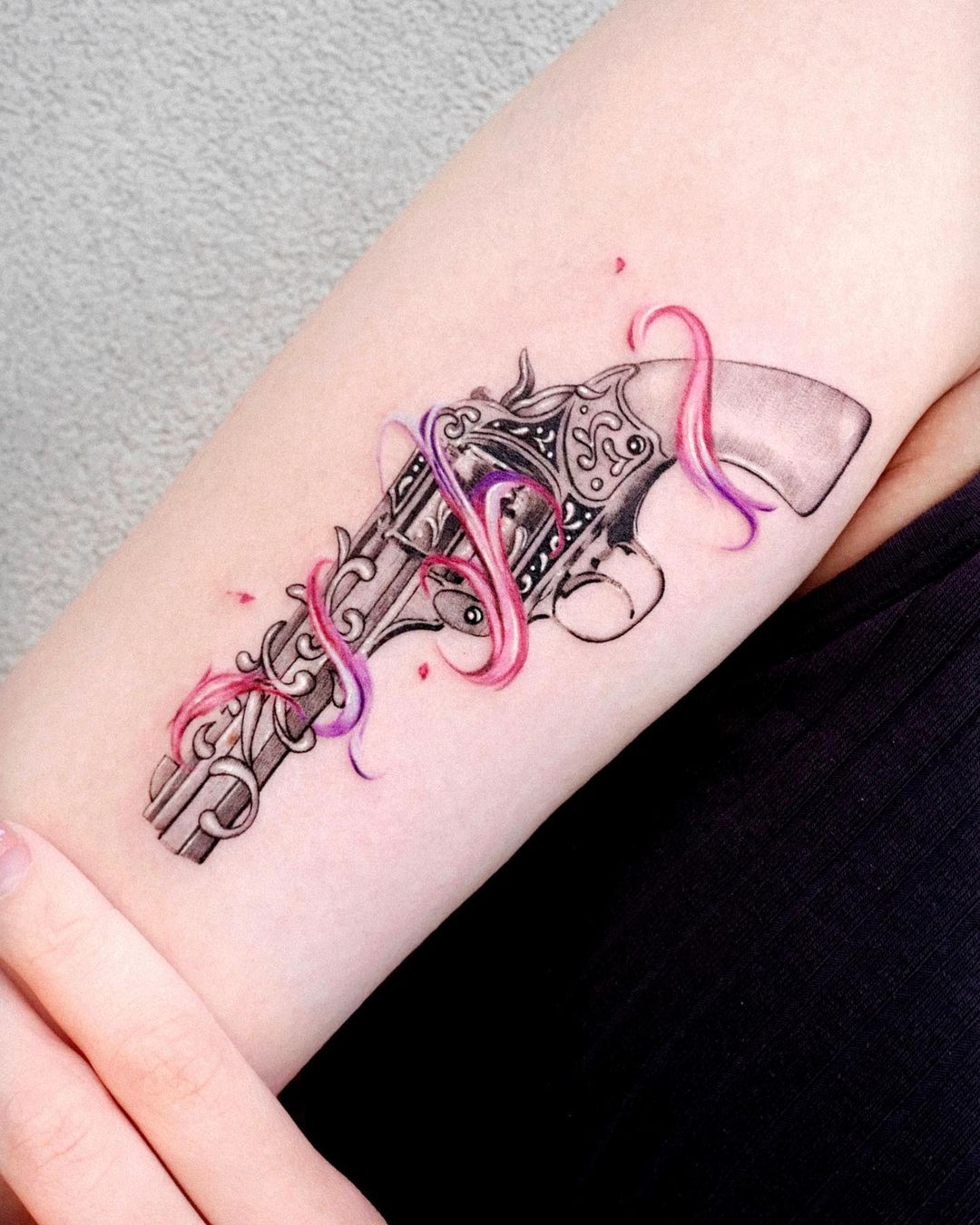 gun tattooo for women by tattooist solar
