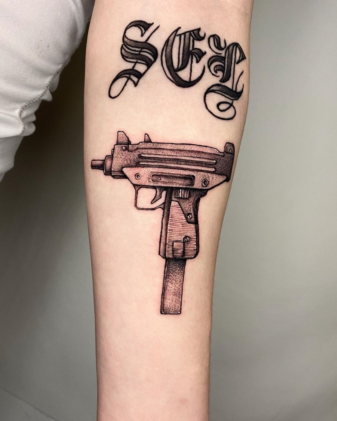 gun tattoos for men by jumbomade