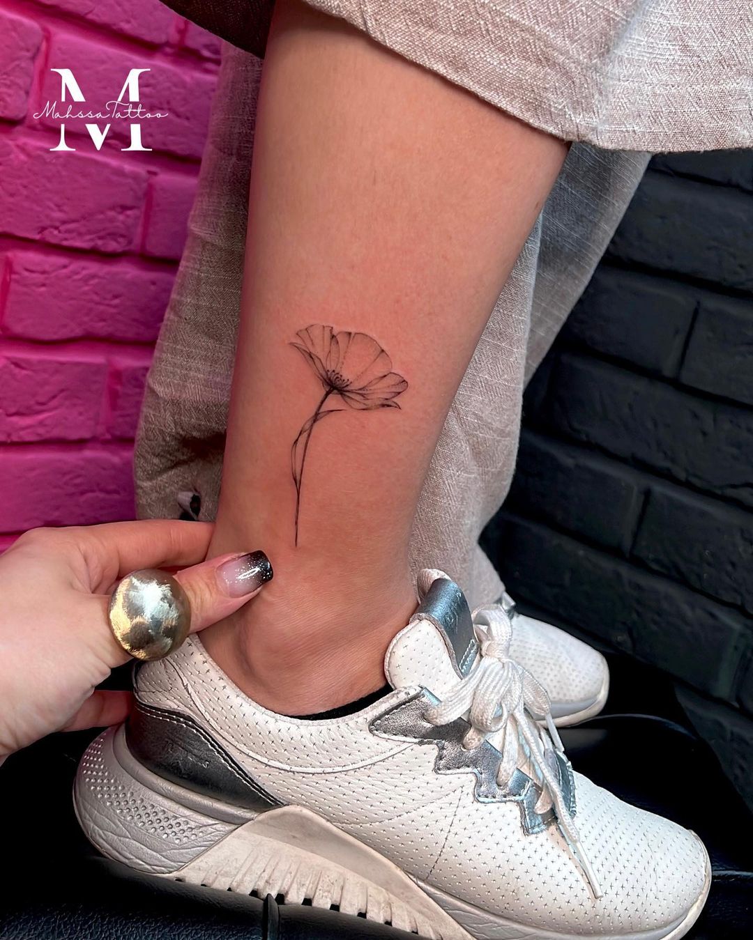 small flower leg tattoo by mahssatattoo