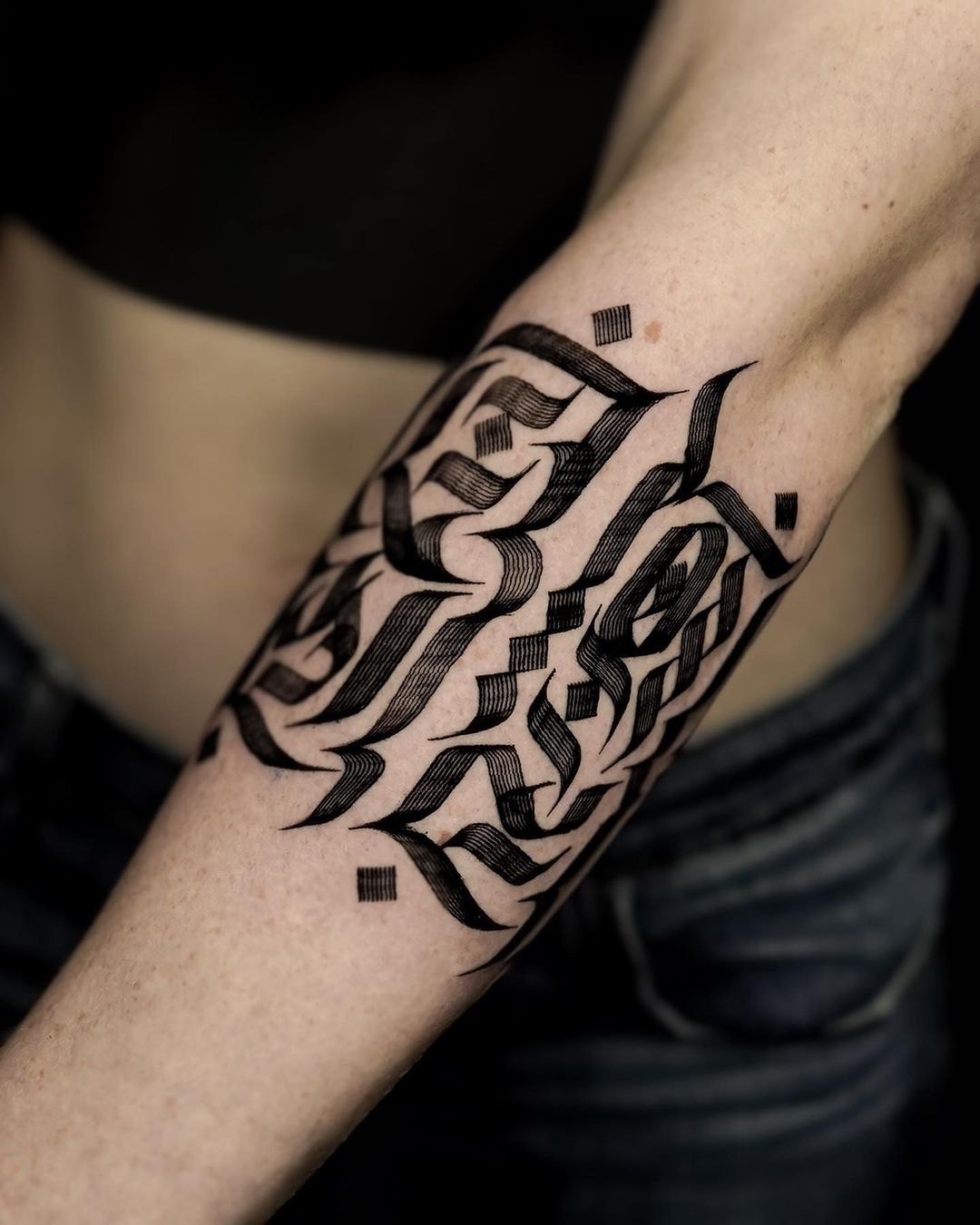 unique black ink tattoo by rosmaztattt