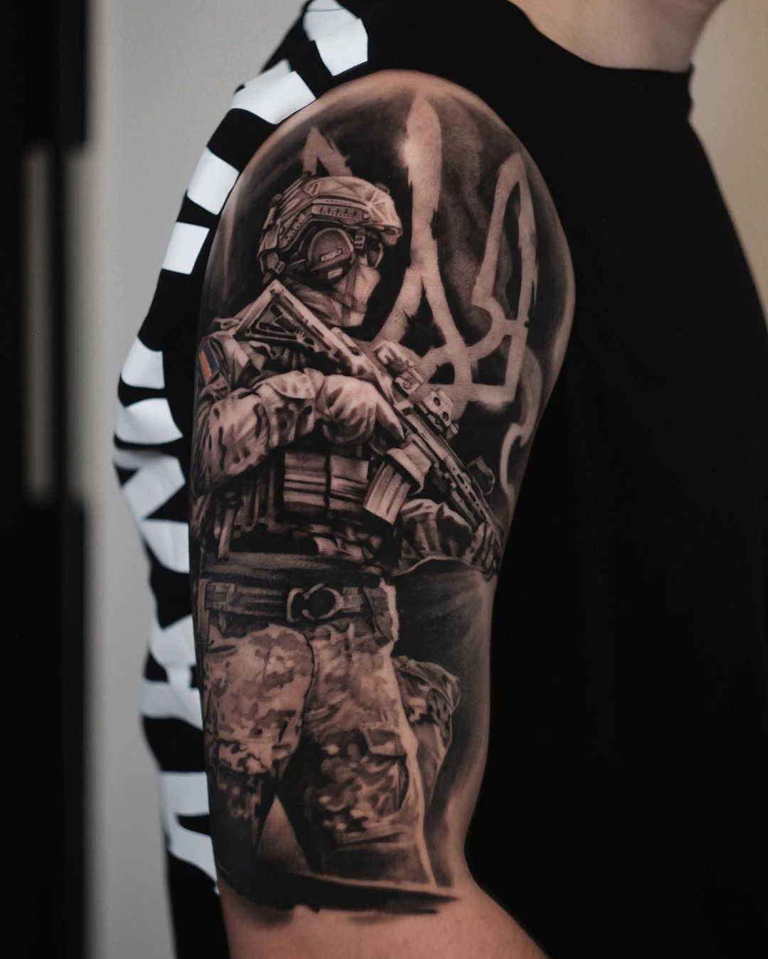 Black inked soldier tattoo by igorblacktattoo