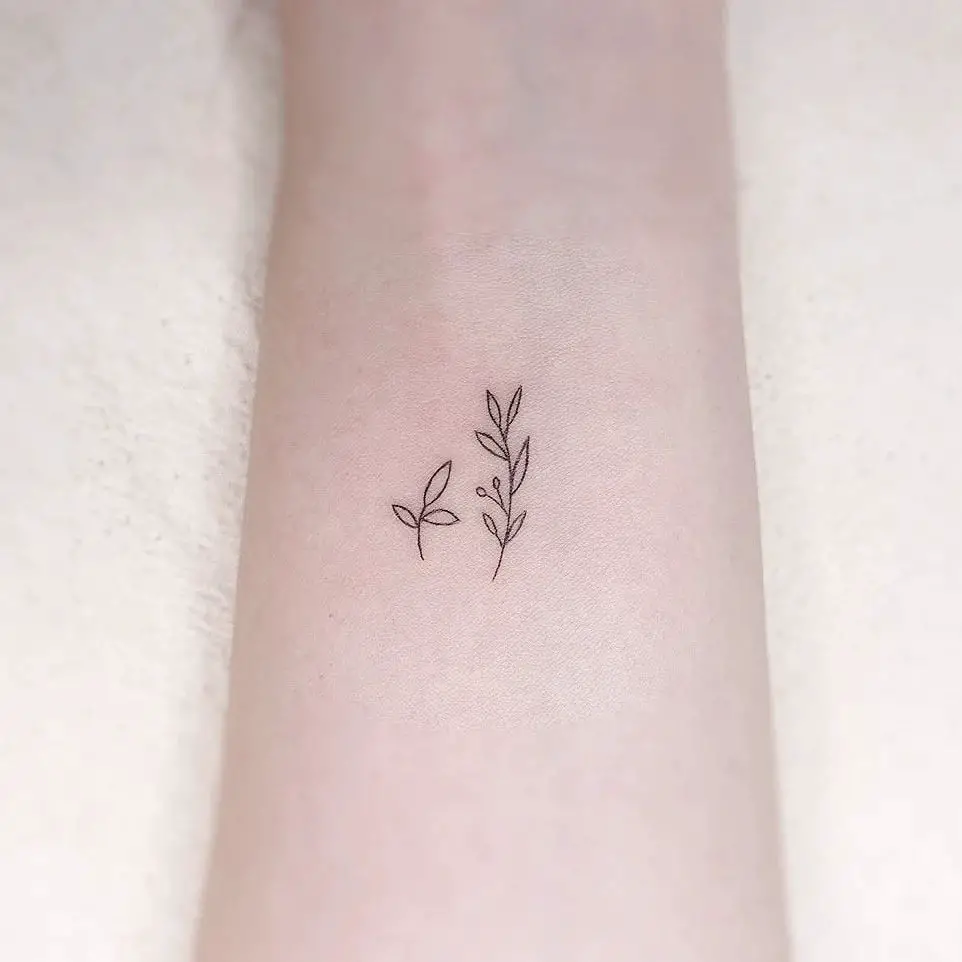Fineline leaf tattoo by gorae tattoo
