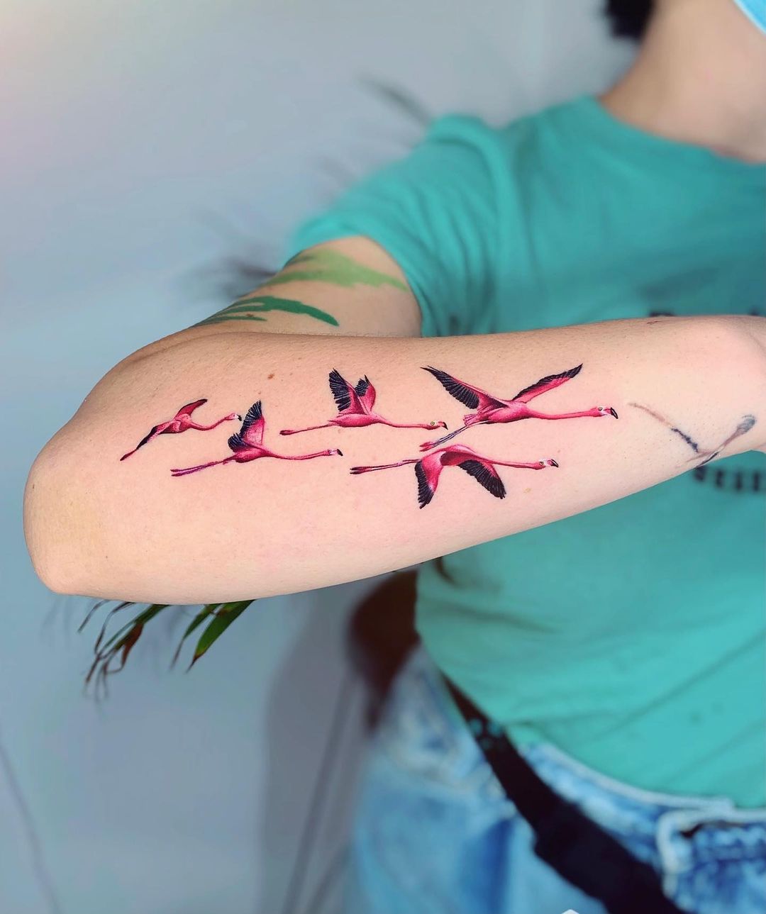 Flamingo forearm tattoo design by yubarta tattoo