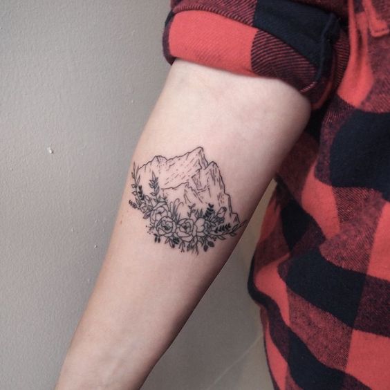 Floral mountain tattoo