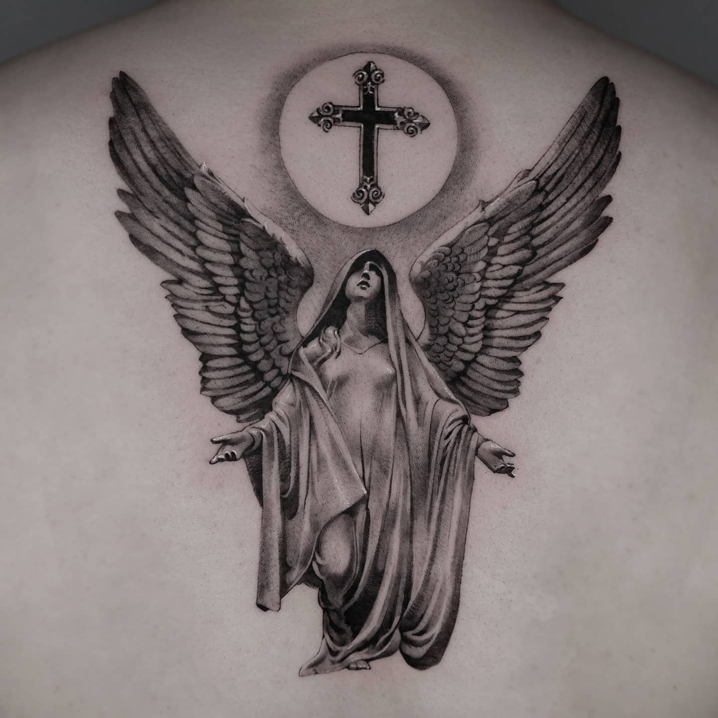 Realistic cross design by tattooist hwi