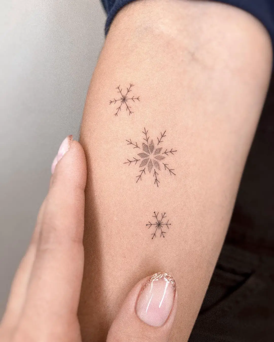 Realistic snowfalke tattoos by alina.tattoo.ink