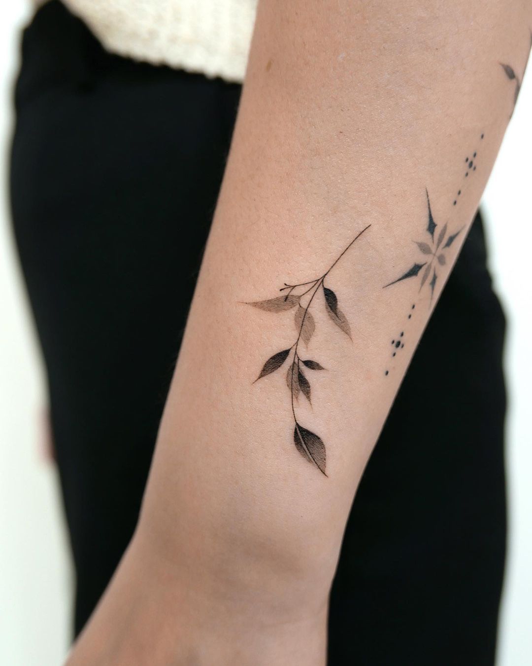 Small leaves by tattooist kam4