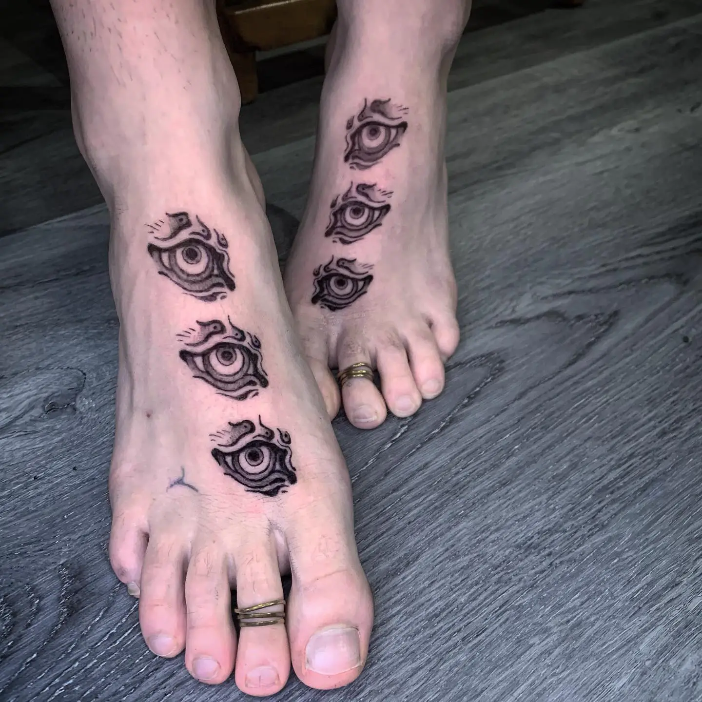 Unique feet tattoos by kudan tattoo