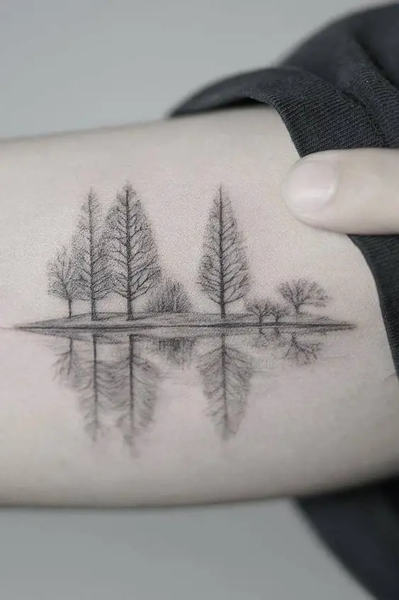 beautiful simple forest tattoo