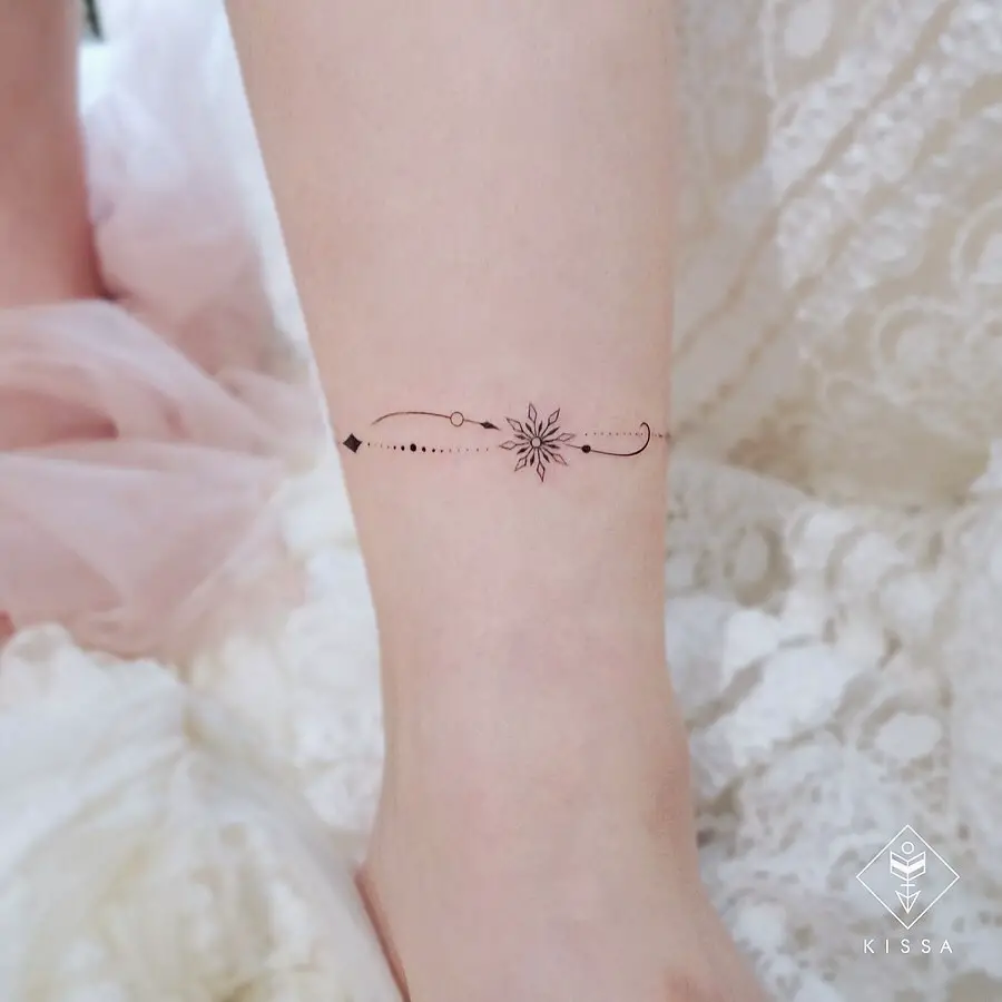 beautiful snowflake tattoo by kissa.tattoo
