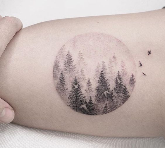 black ink forest tattoo for women
