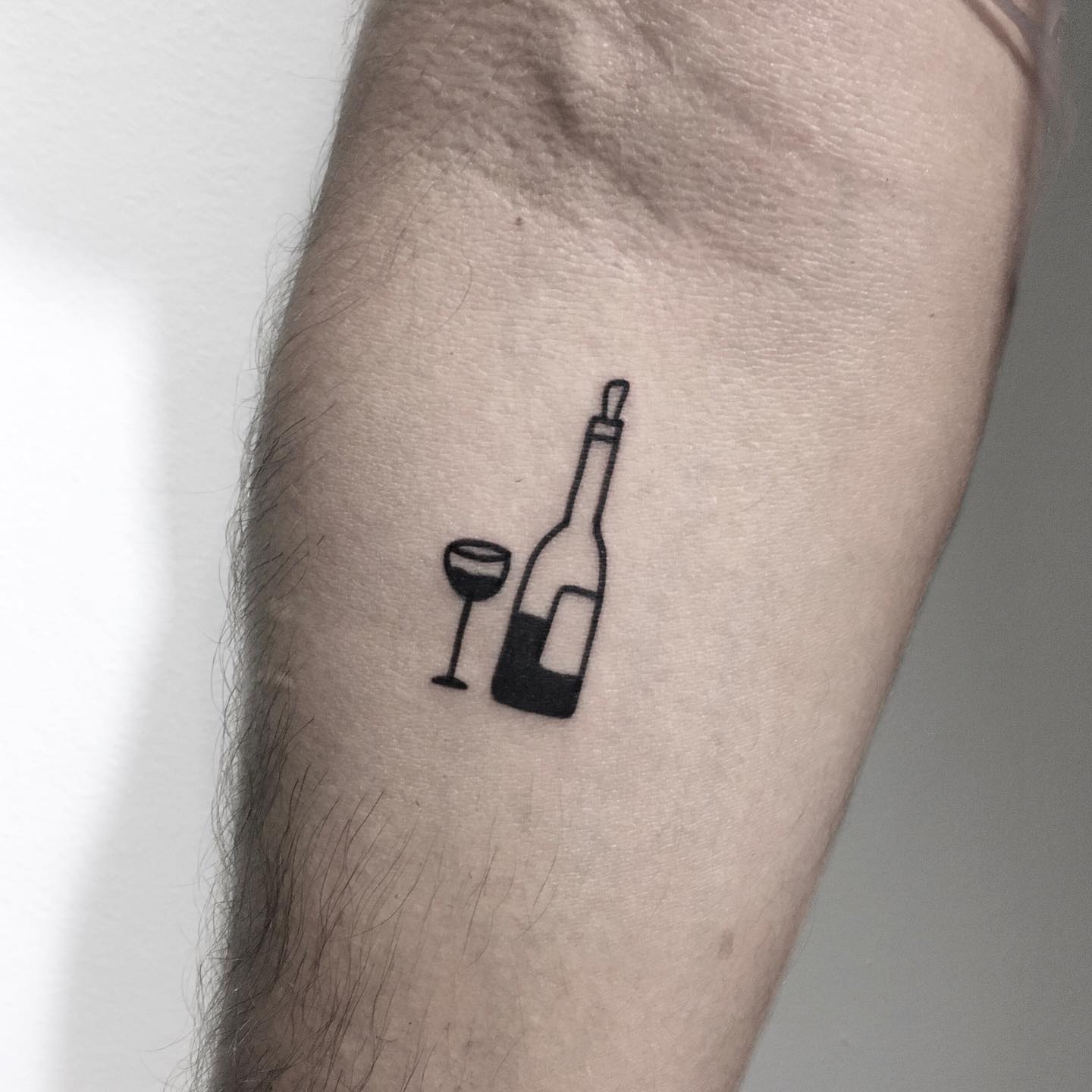 bottle and wine tattoo by nancydestroyer