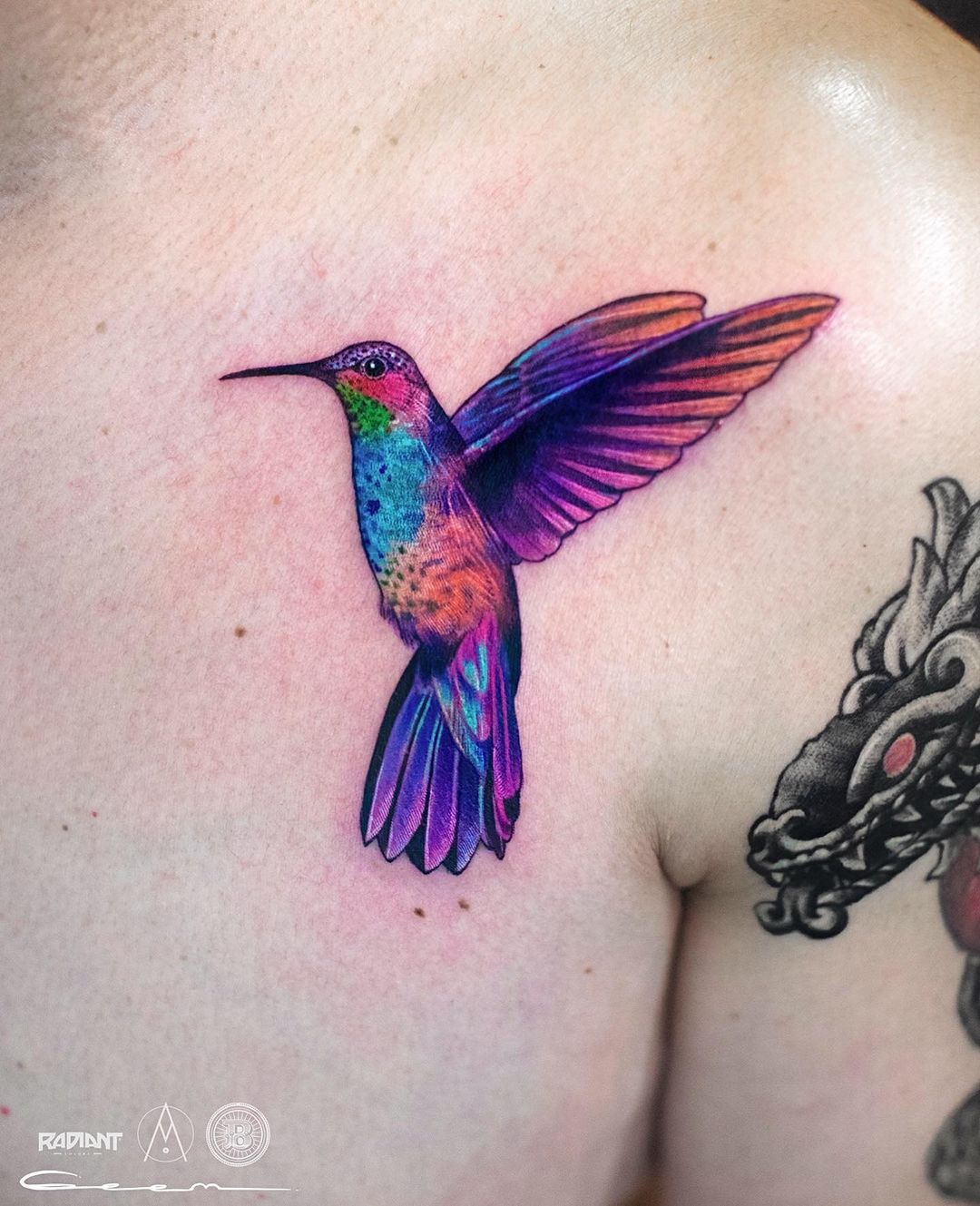 colorful bird tattoo by geem tattoo