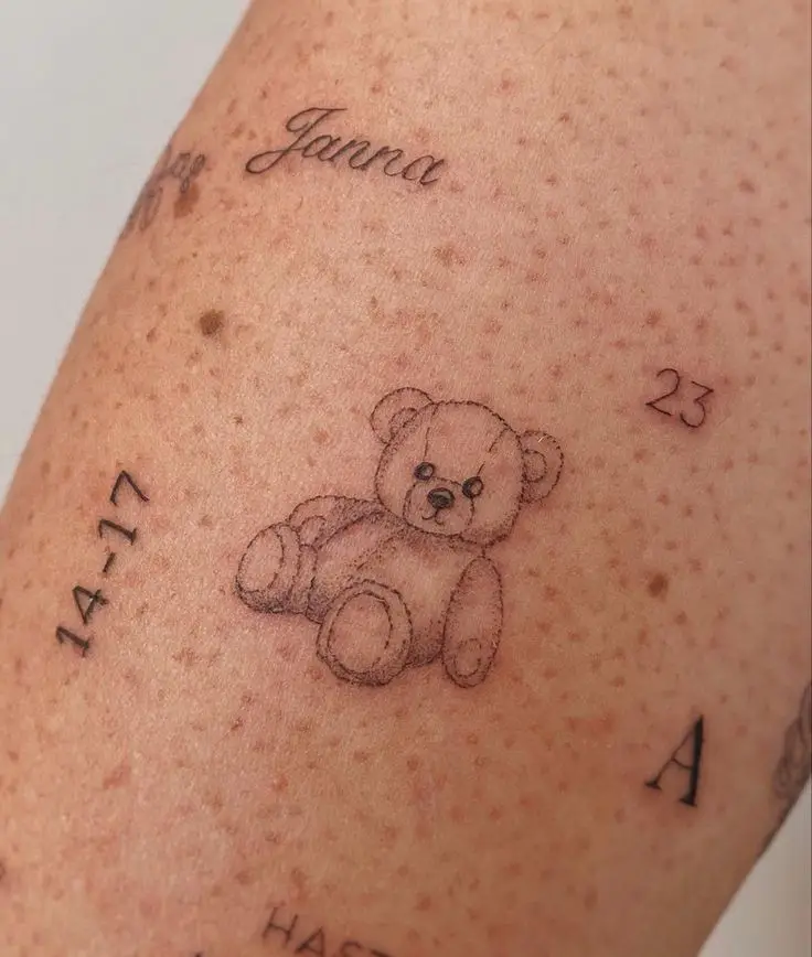 cute and minimal bear tattoo