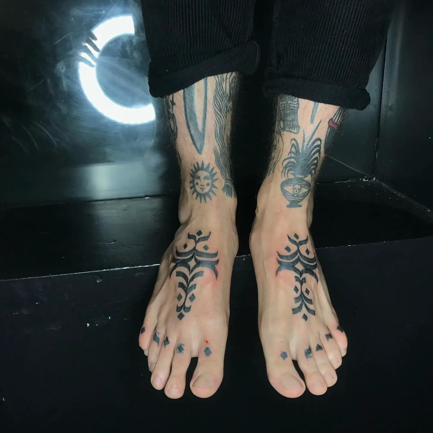 feet tattoo designs by a brunello