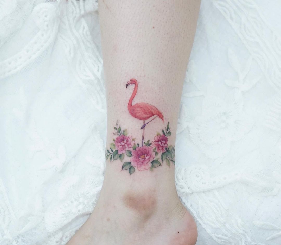 floral flamimgo tattoo ideas by tattooist silo