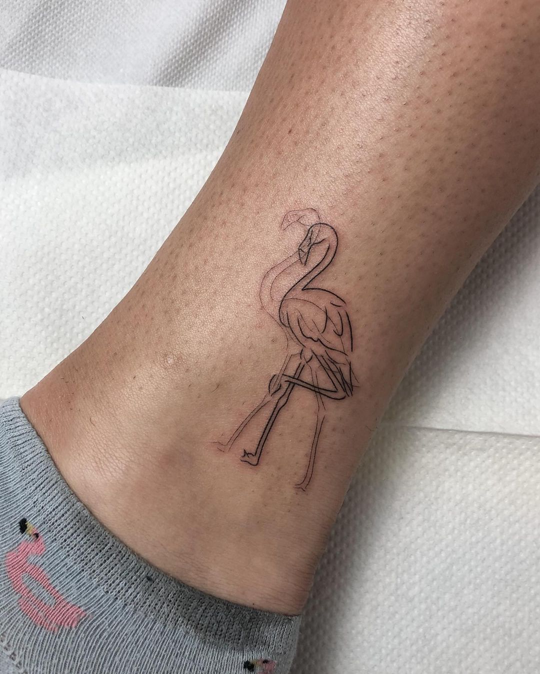 minimalistic flamingo tattoo by gaja tat