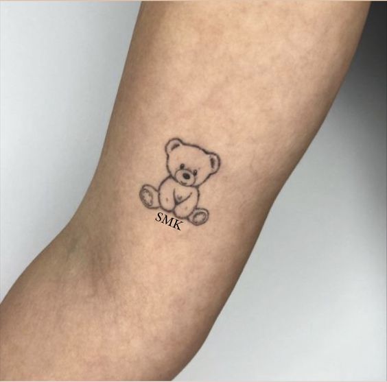 minnimalistic bear tattoo