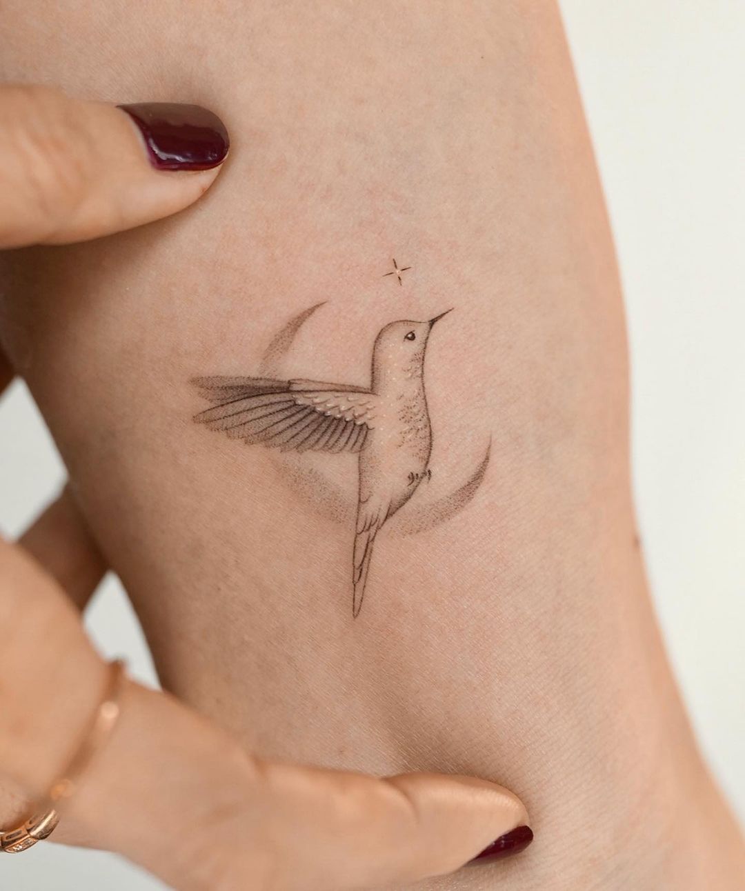 small hummingbird design by kathy tattoo