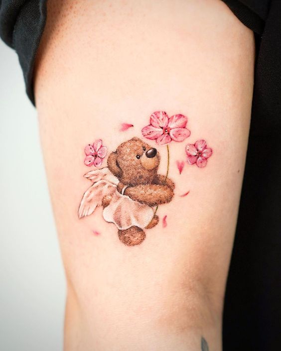 teddy with flower tattoo