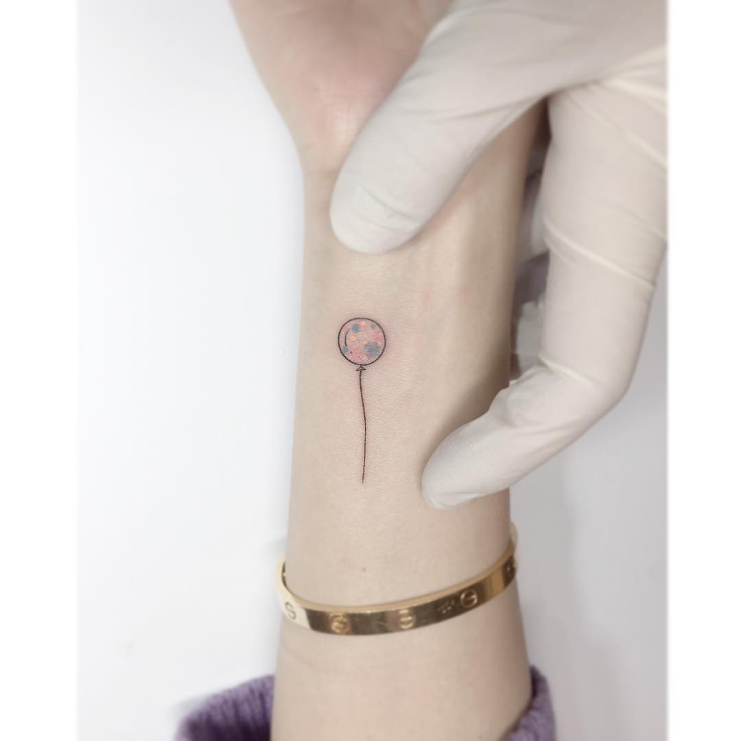 Balloon on forearm by playground tat2
