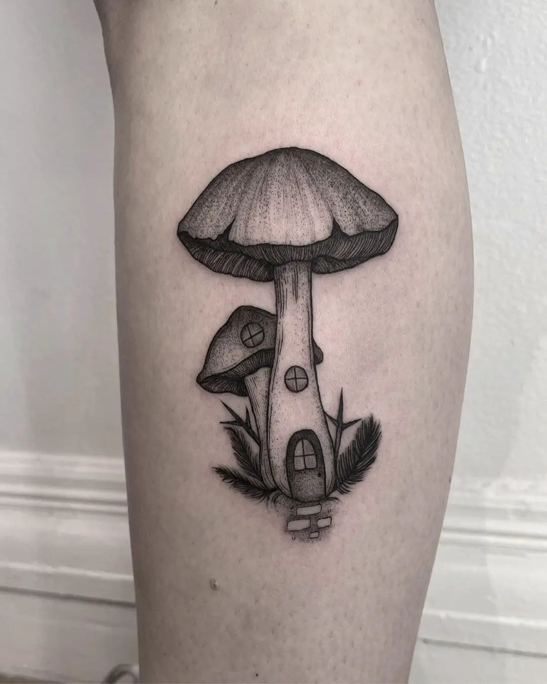 Black and gray mushroom tattoo by sabrinaathenabialek