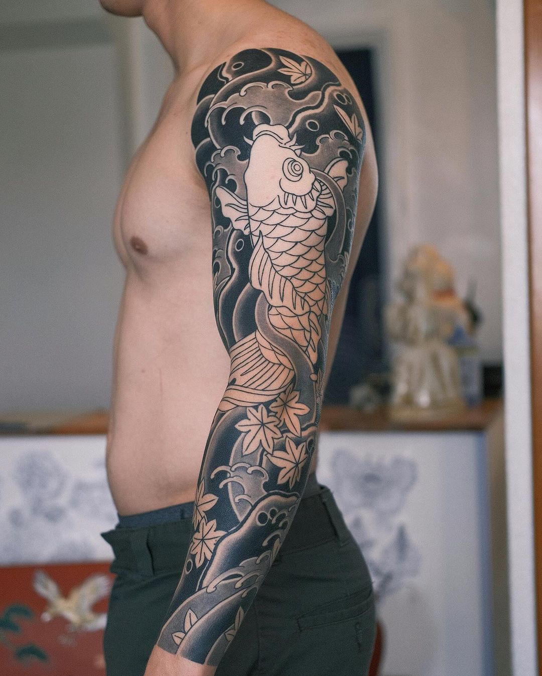 Black and grey fish tattoo by lilb wabori