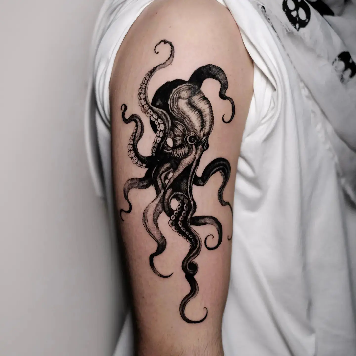 Black and white octopus tattoo by burcu.ink