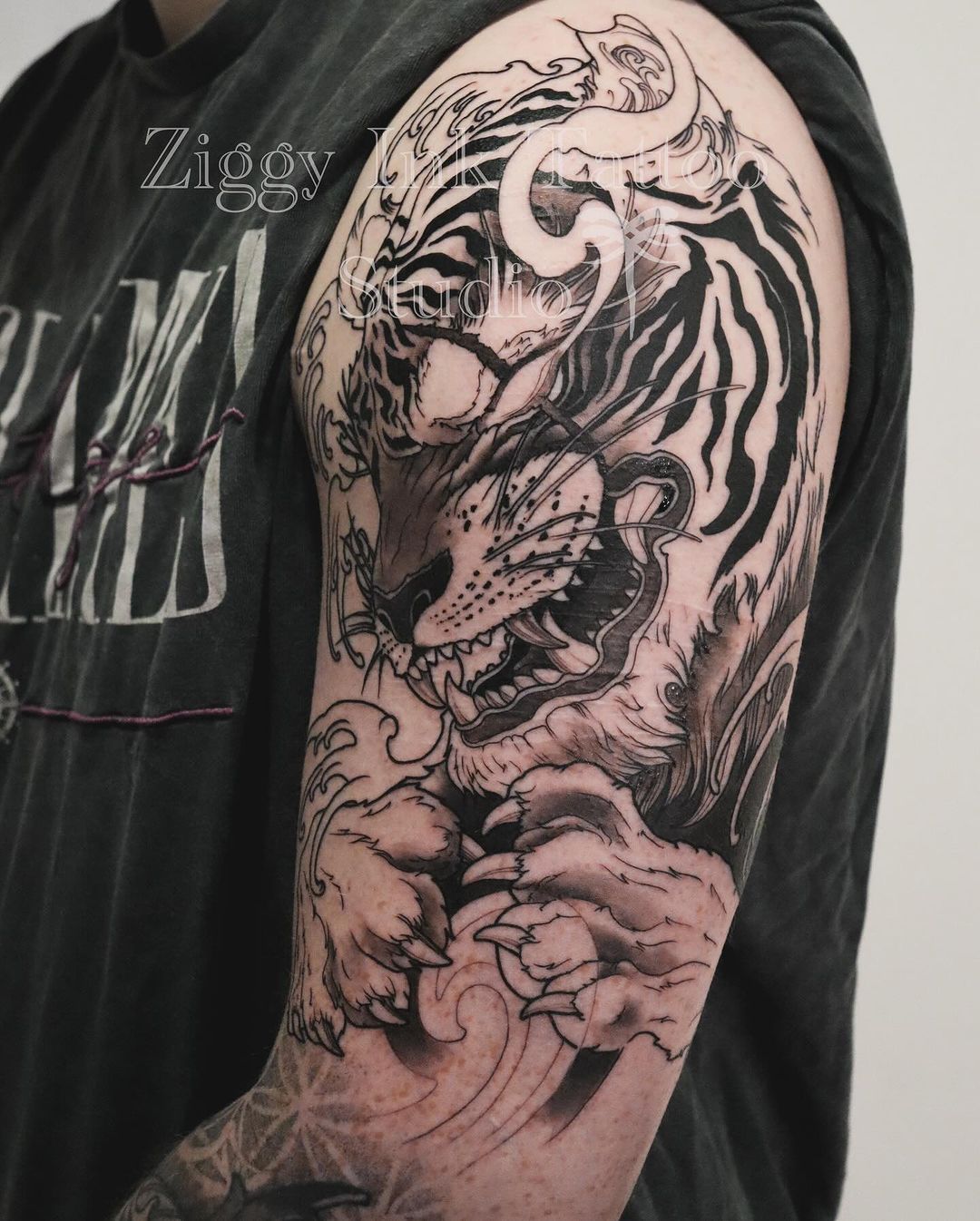 Black inked tiger design by ziggyinktattoostudio