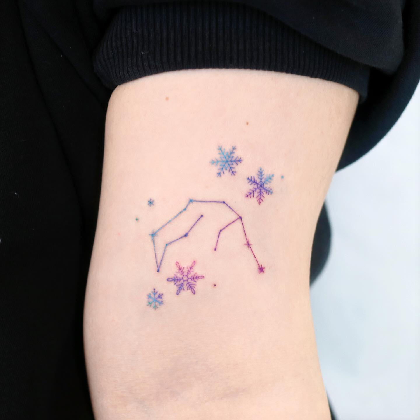 Colored snowflake tattoo by palette.tt