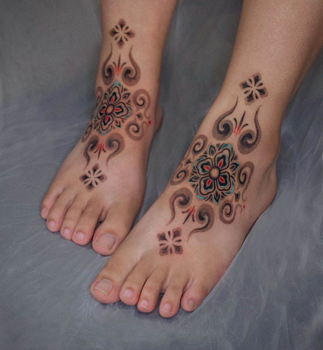 Infant footprint with wings tattoo idea | TattoosAI