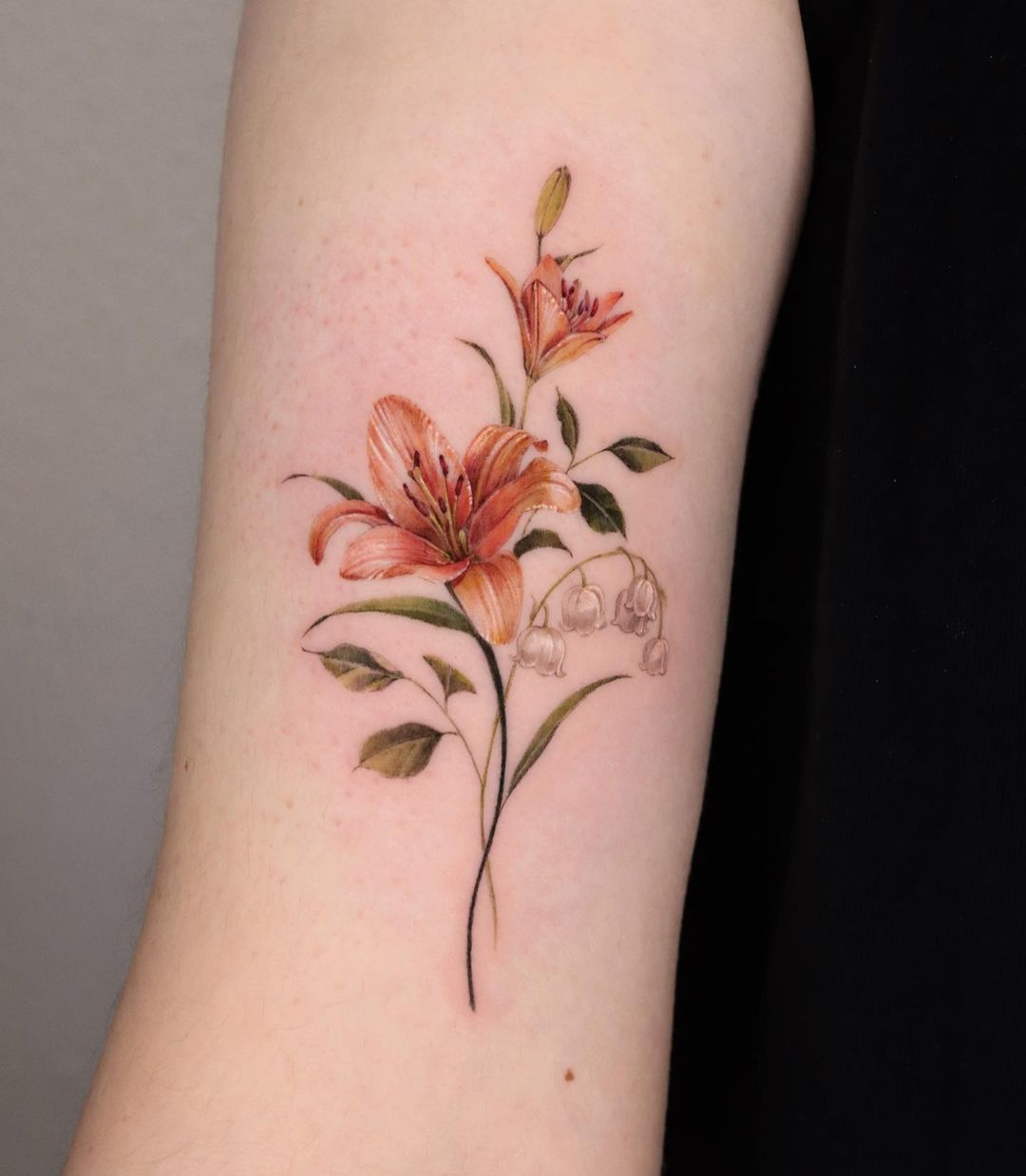 Realistic flower tattoo by stella.tattoo