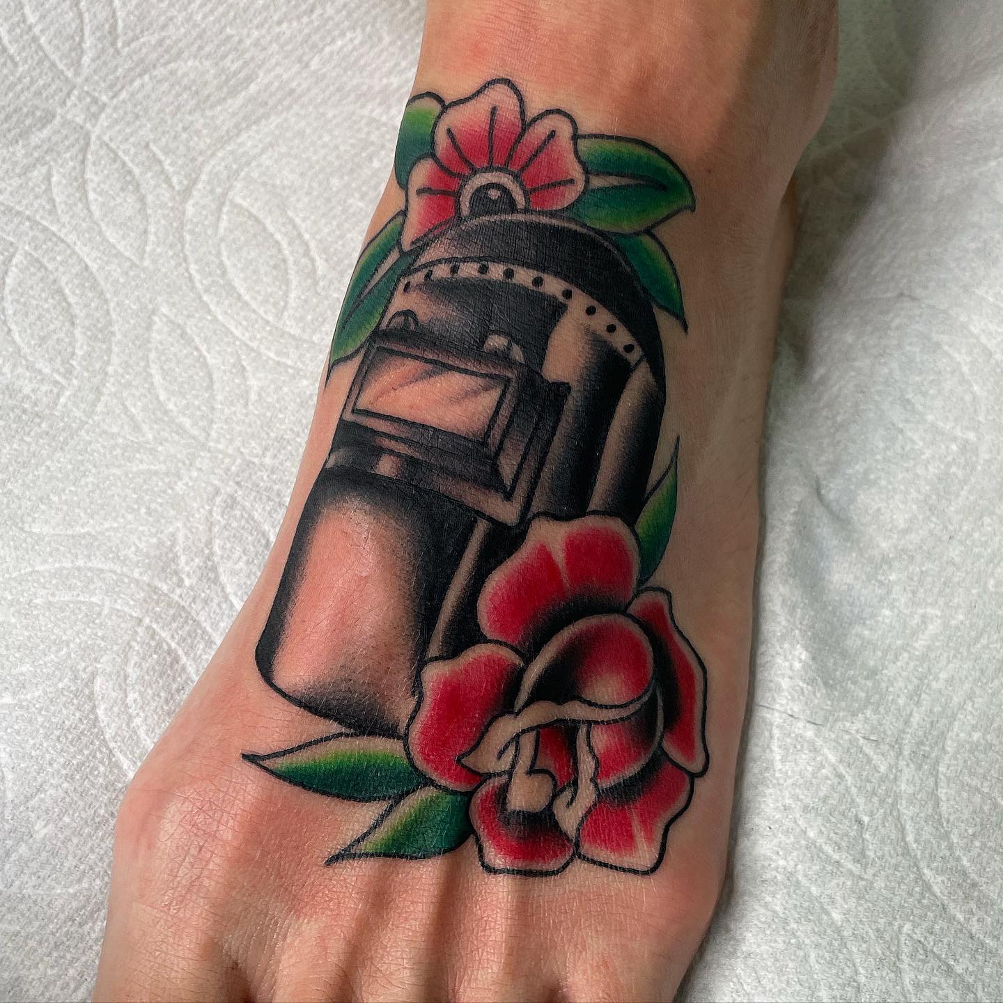 Red rose tattoo on feet by gitattoos jay