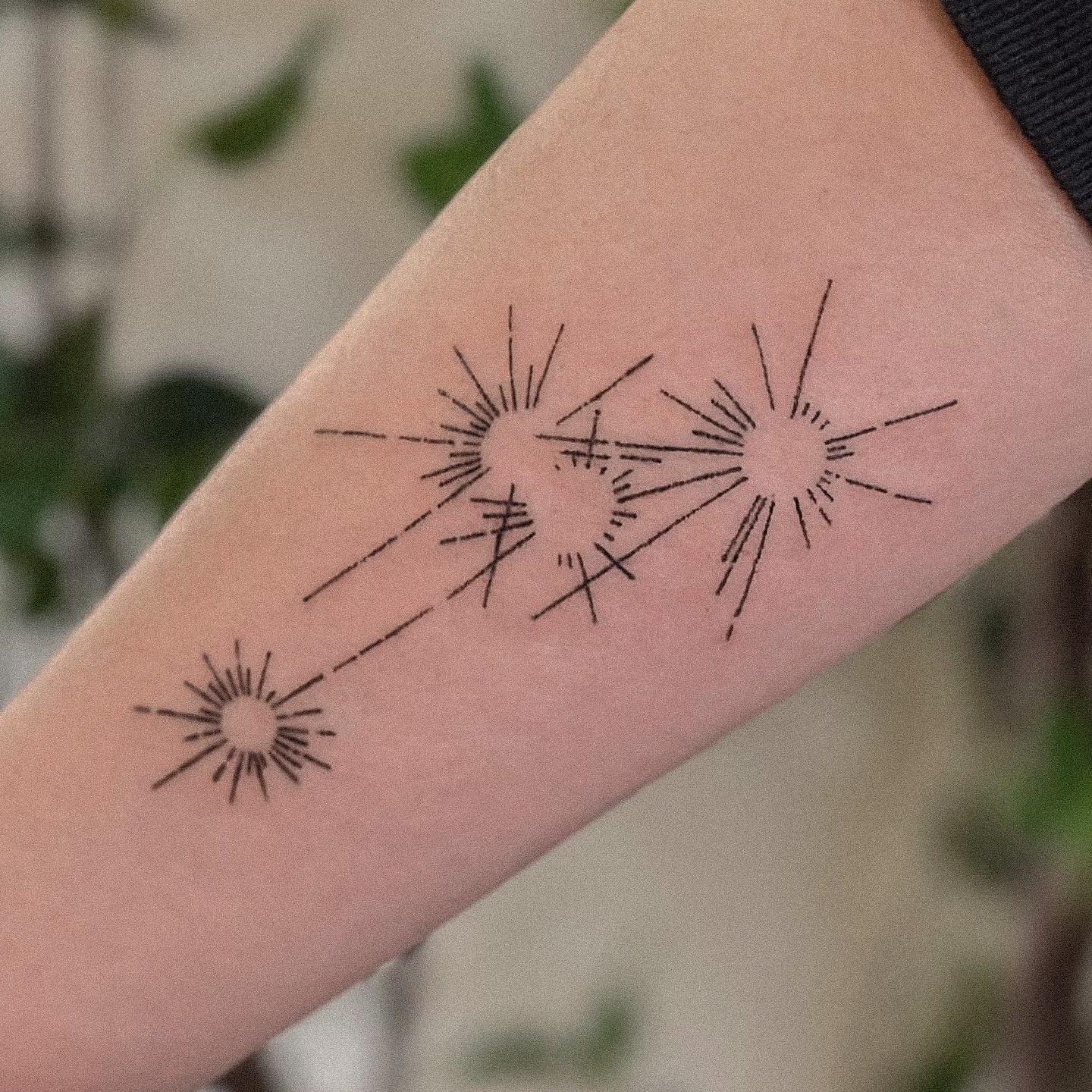 black inke firework tattoo by jusqu tattoo
