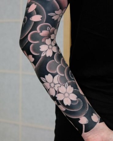 16 Beautiful Cherry Blossom Tattoo Ideas For Women To Express Blooming Love