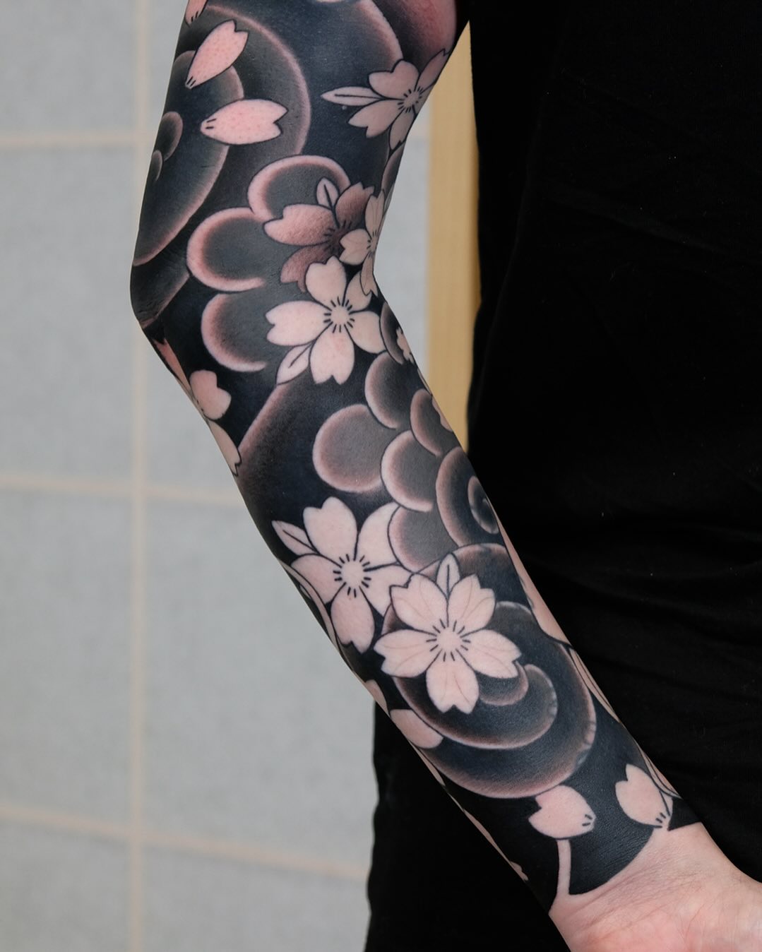 cherry blossom sleeve tattoo by ubik tattoo