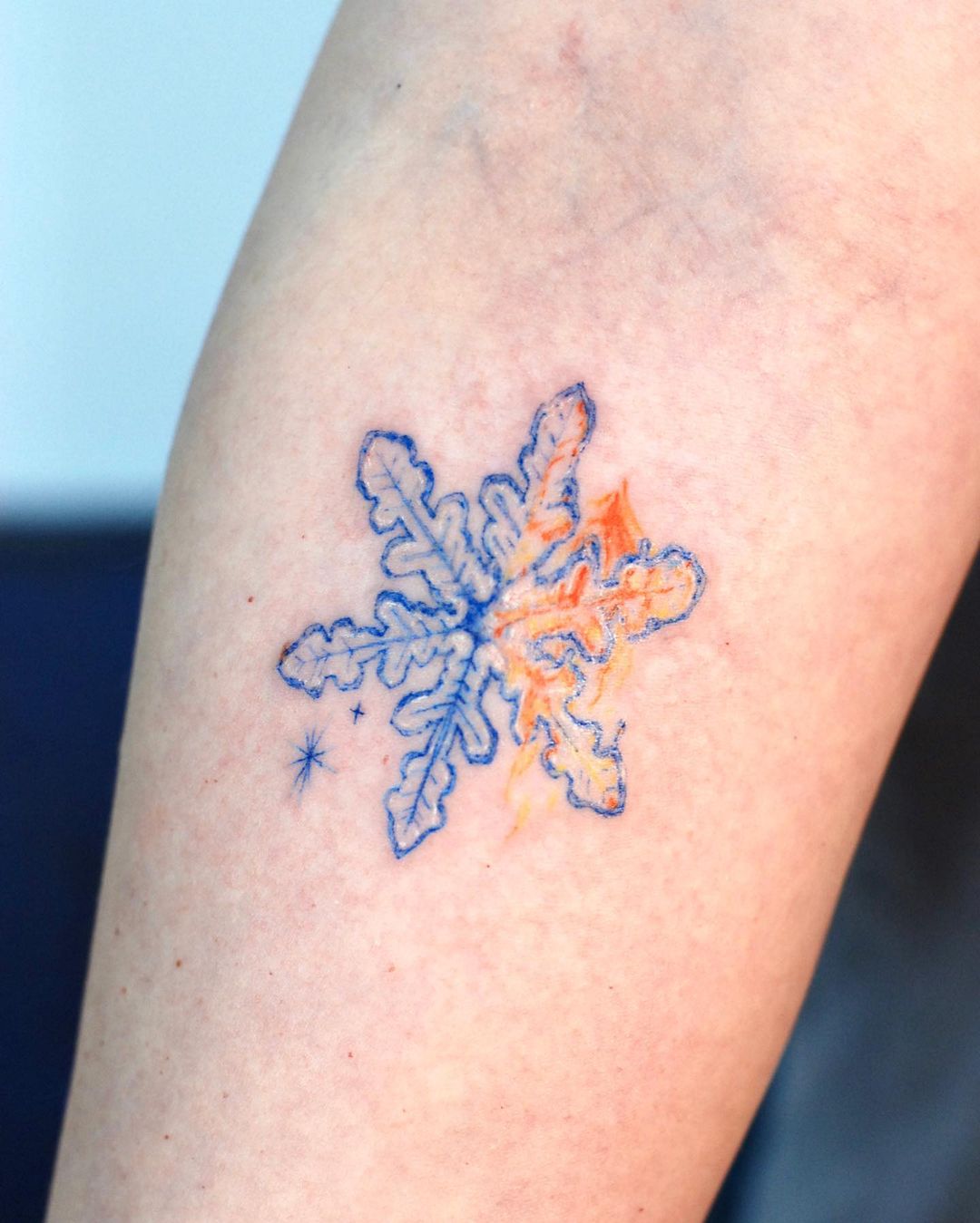 colored snowflake tattoo ideas by second.pin
