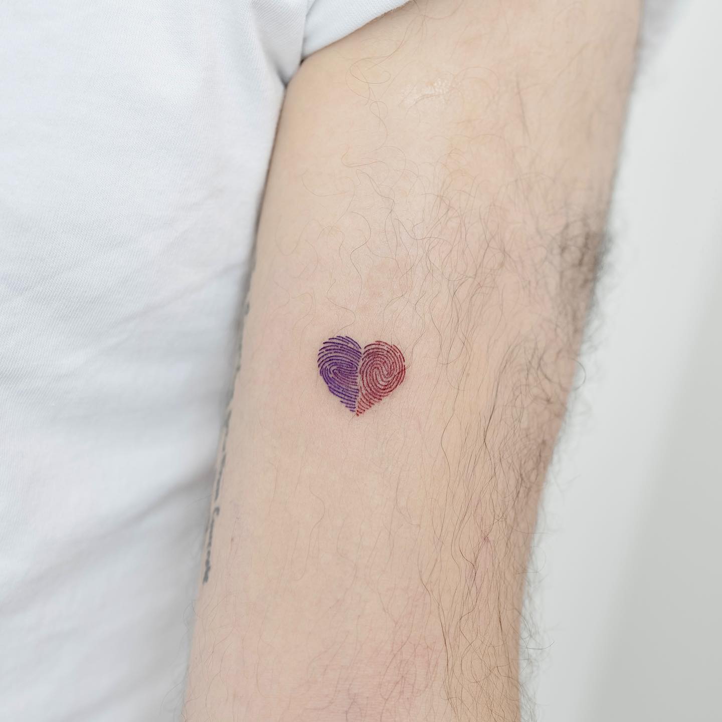 couples fingerprint tattoo by heim tattoo